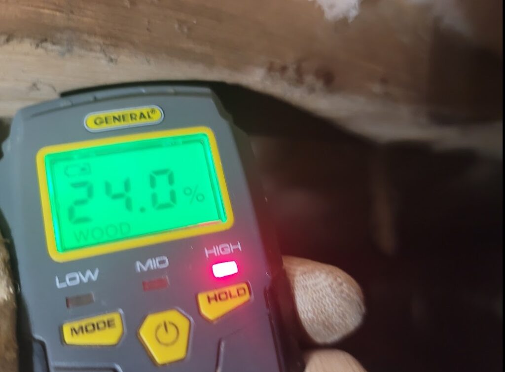 Falling and damaged crawl space insulation due to high humidity in a Raleigh, NC home. Moisture problems can lead to mold, wood rot, and energy loss.